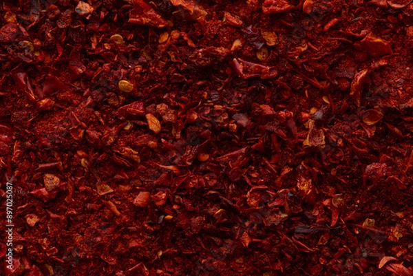 Fototapeta Red paprika powder texture. Background with copyspace. Top view