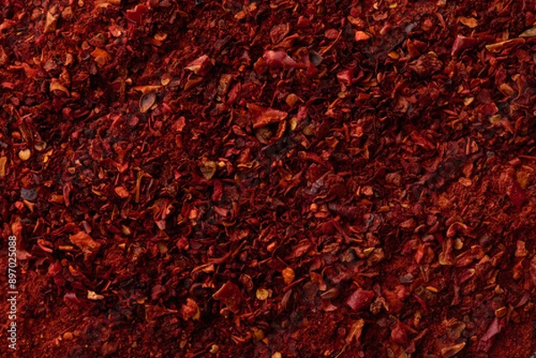 Fototapeta Red paprika powder texture. Background with copyspace. Top view
