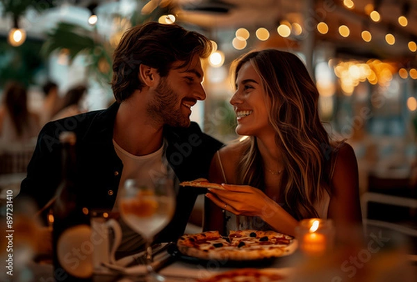Fototapeta Romantic dinner with pizza, wine, and twinkling lights, creating cozy setting for couple to enjoy