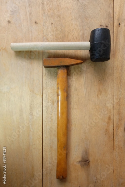 Obraz Steel hammer and Rubber Hammer on wooden background