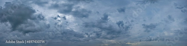 Fototapeta Russia, south of Western Siberia. Panoramic view of the evening sky with the setting sun and colorful clouds.