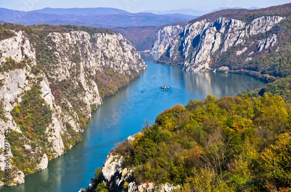 Fototapeta 2000 feets of vertical cliffs over Danube river at Djerdap gorge