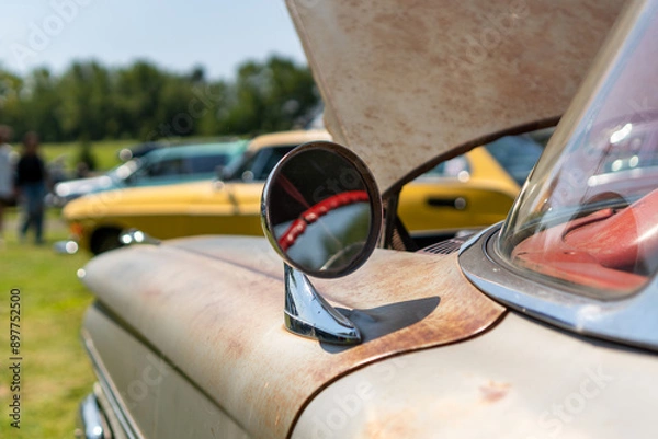 Obraz Tight close-up shot of a vintage automobile at a local car show.