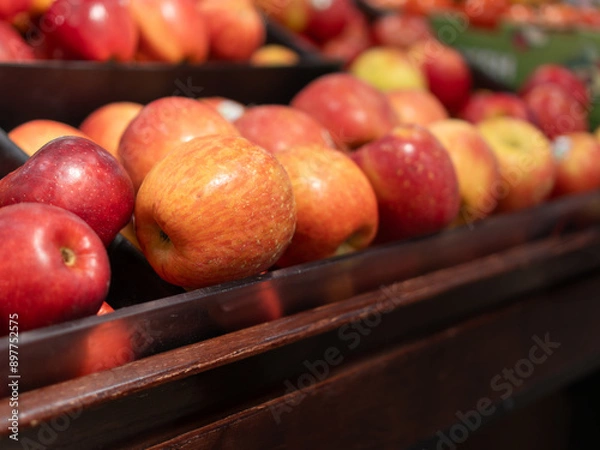 Obraz Close-up image of organic apples displayed at a supermarket.
