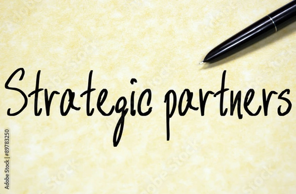 Fototapeta strategic partners text write on paper