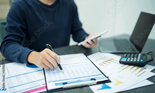 Obraz Word Tax 2024 on the calculator. .Tax deduction planning.Financial research, government taxes, and calculation tax return