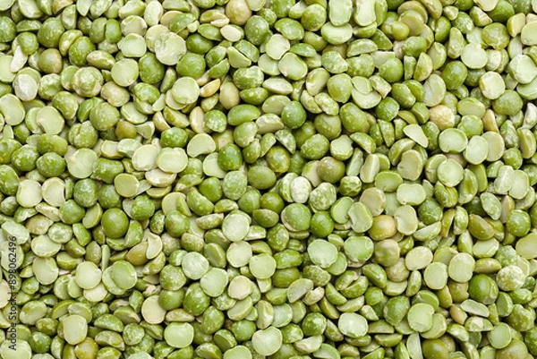 Fototapeta Uncooked, split, green peas background. Dry peas grains. Top view