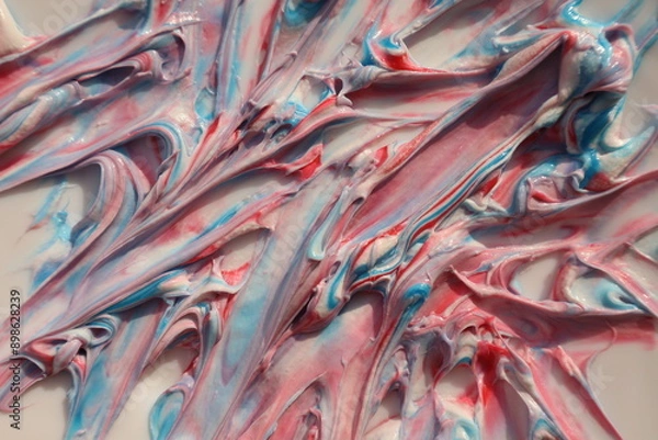 Fototapeta An abstract pattern of thick paint, mixing colors create a sense of movement. Artistic texture