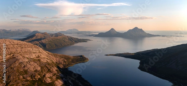 Fototapeta Panoramic view over the island of Tomma, helgeland, Norway in the midnight sun. Seen from over Smaltind, Breitind and Tortenviktind. Nighttime summer Norwegian hiking, fjelltur. Dusk and dawn, arctic