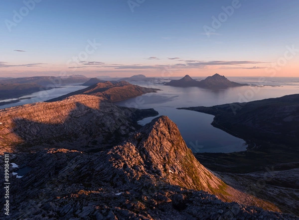Fototapeta Panoramic view over the island of Tomma, helgeland, Norway in the midnight sun. Seen from over Smaltind, Breitind and Tortenviktind. Nighttime summer Norwegian hiking, fjelltur. Dusk and dawn, arctic