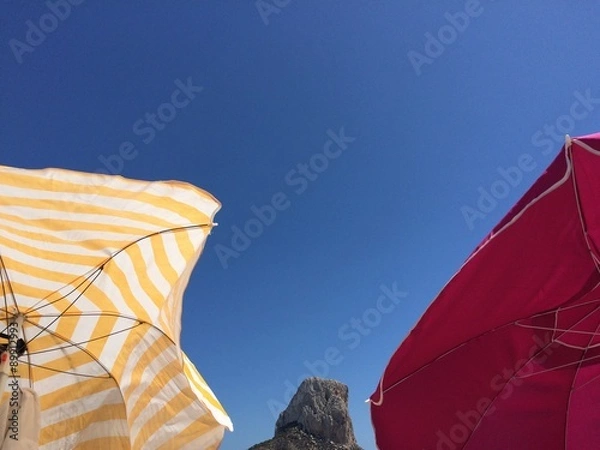 Fototapeta umbrellas at beach in calp, spain mediterranean coast