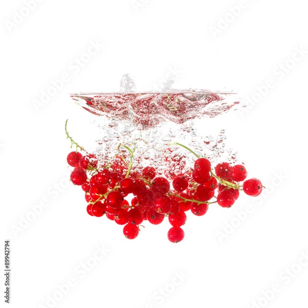 Fototapeta Currants splash on water, isolated on white background. Use for fresh drinks advertising.