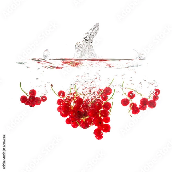 Fototapeta Currants splash on water, isolated on white background. Use for fresh drinks advertising.