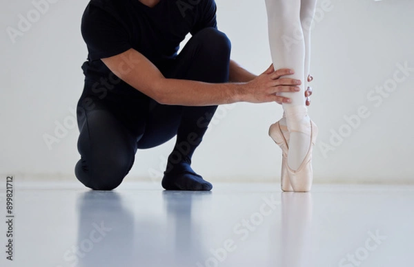 Fototapeta Ballet, girl and teacher for balance feet for position, correct posture and alignment for technique. Male mentor, student and ballerina for instruction for dance training, performance and practice.