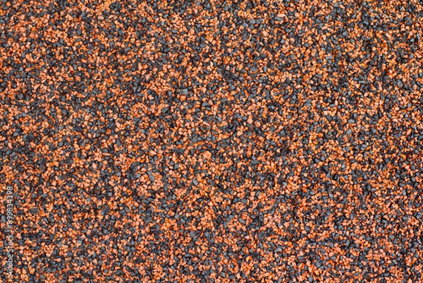 Fototapeta Texture of color rubber floor on Stadium or Granules playground cover background.