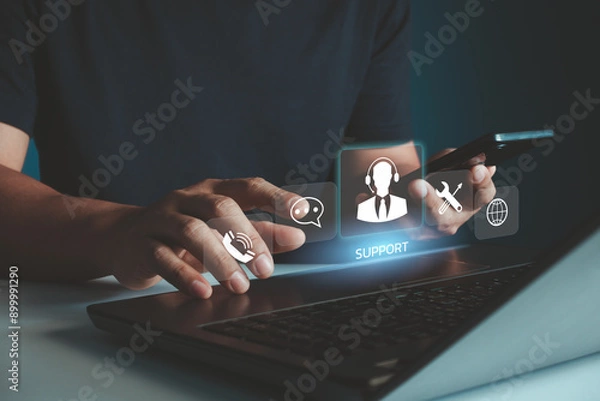 Fototapeta IT support, Technical support customer service concept, User hand using computer laptop with VR screen support customer icon, Technology internet concept, call center and customer service help 24 hrs.
