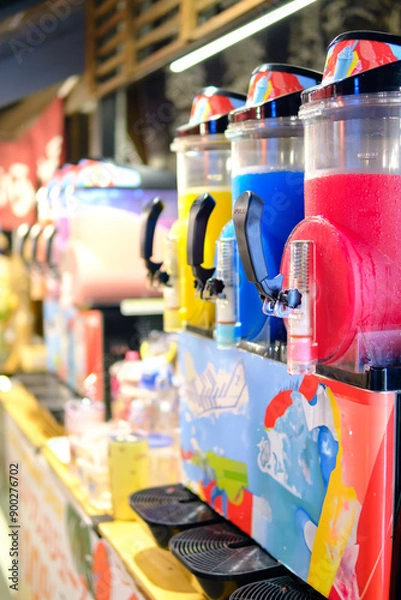 Fototapeta Colorful slush machine with blurred background