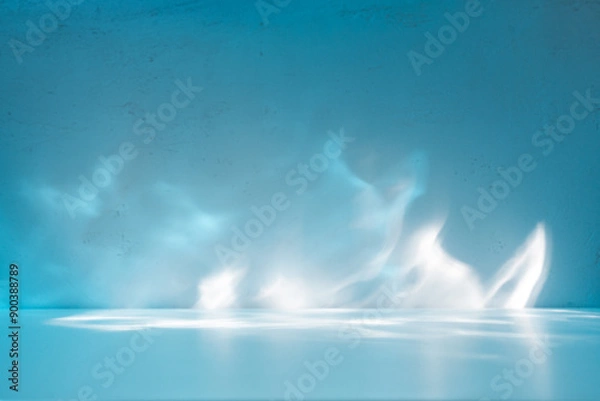 Obraz Simple abstract light blue background for product presentation with sun light reflections and shadows on wall. Winter background.
