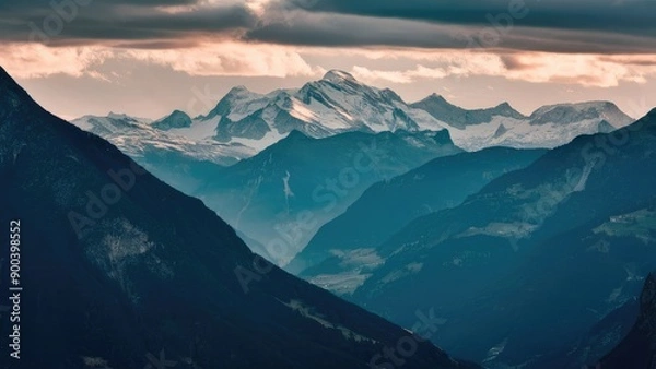 Fototapeta Vibrant Sky Above Harsh Mountain Terrain