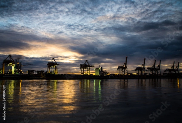 Fototapeta Container Cargo freight ship with working crane loading bridge i