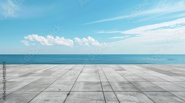 Fototapeta A view of the ocean from a concrete floor, perfect for architecture and design concepts
