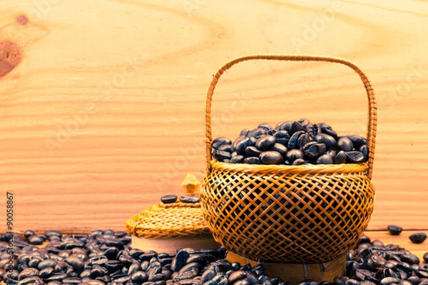 Obraz .Coffee beans roasted in bamboo baskets..