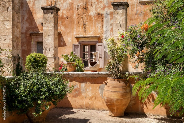 Obraz Цветы на фоне стены старого дома. Греция. Крит 