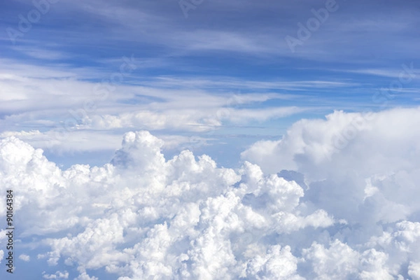 Fototapeta Skyline View above the Clouds from air plane.