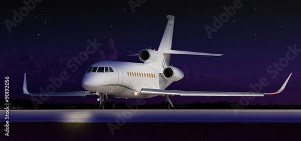 Fototapeta Private jet taxiing in the dark