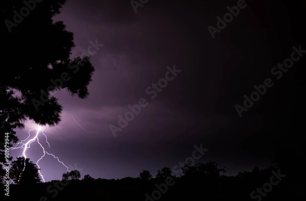 Fototapeta Thunderstorms and lightning at night.