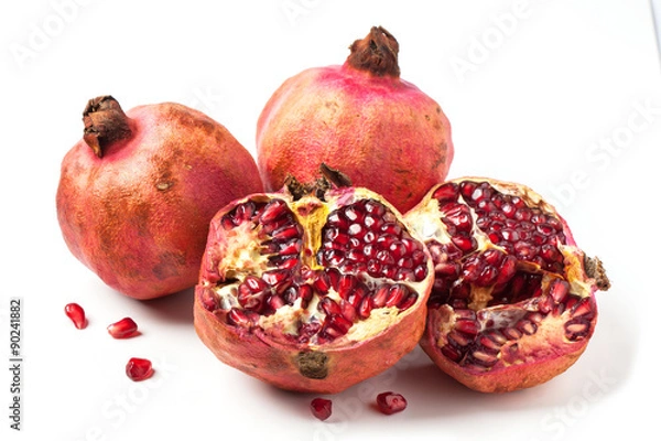 Obraz Pomegranates over white