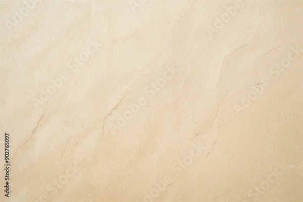 Fototapeta a blank, slightly textured beige paper background