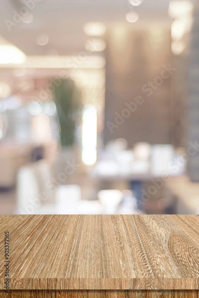Fototapeta Table and blur restaurant background, Wooden counter cafe over blur bokeh light background, Shelf for food and retail shop, store food and product display backdrop, banner, mockup, vertical