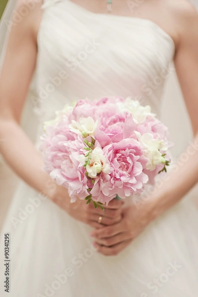 Obraz Wedding bouquet at bride's hands