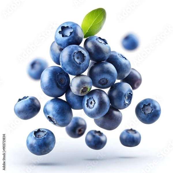 Fototapeta Close-up of fresh blueberries floating against a white background