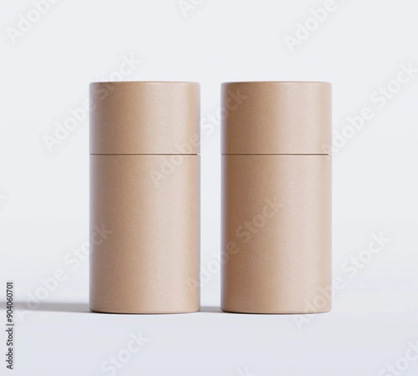 Fototapeta Brown Paper tube package mockups isolated on white background. Blank craft carton circular realistic tube texture. Cylindrical container with cap for product branding 