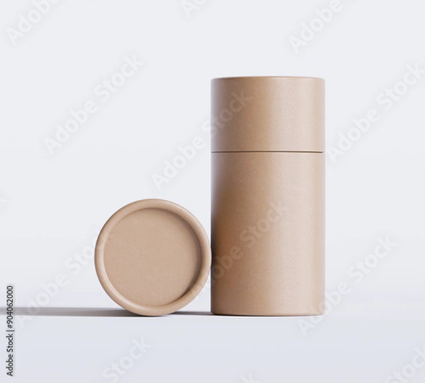 Fototapeta Brown Paper tube package mockups isolated on white background. Blank craft carton circular realistic tube texture. Cylindrical container with cap for product branding 