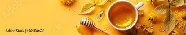 Obraz E-commerce Ready: Invigorating Bodhi Tea and Honey Bowl on a Vibrant Orange Background, Optimized for Commercial Use.