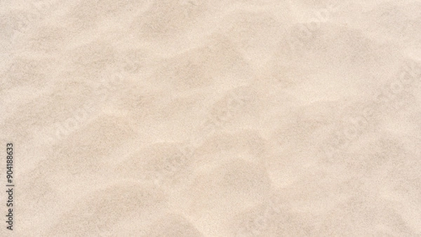 Fototapeta Sand ripple texture top view, Empty rough dry brown sand beach shore background, Grain pattern yellow sand dune in summer  