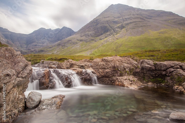 Fototapeta Famous Fairy Pools with Cuilin Mountains on the background, Isle of Skye, Scotland