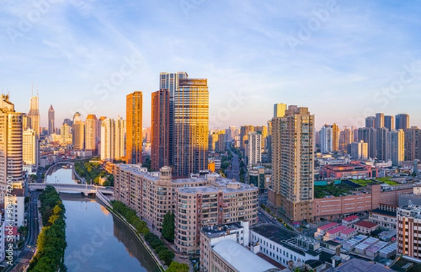 Fototapeta Aerial view of modern city skyline and buildings at sunrise in Shanghai.