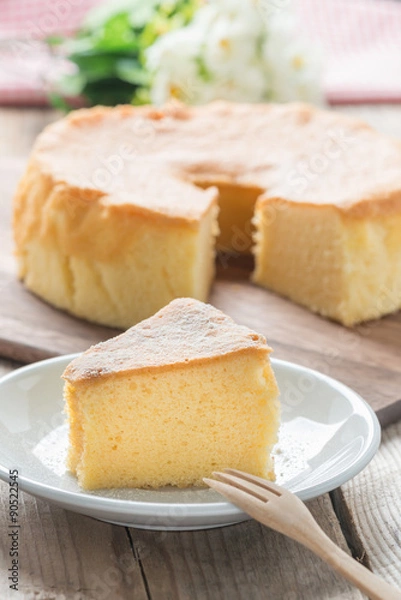 Fototapeta Chiffon cake on white dish.