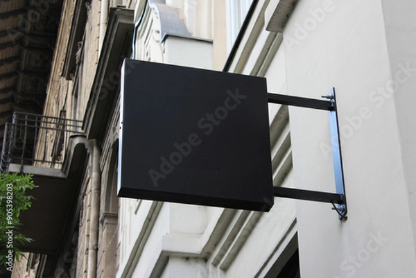 Fototapeta Outdoor hanging mounted sign on the wall mockup template. Signboard mock up for logo presentation.