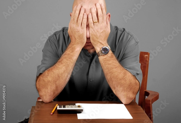 Obraz Człowiek wykazujący oznaki stresu podczas budżetu pracy