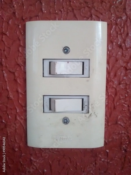 Fototapeta Interruptor na parede vermelha