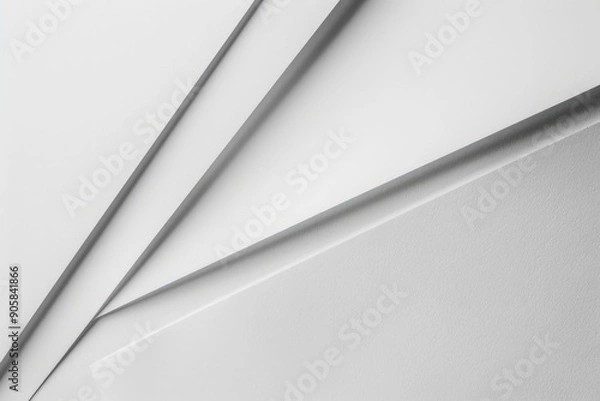 Fototapeta A close-up shot of a blank white sheet of paper, ideal for use in educational or creative contexts