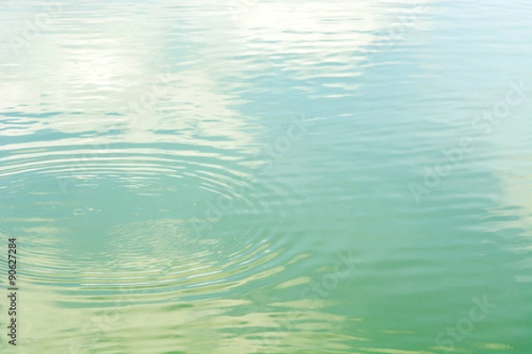 Obraz ripples and reflection in the river 