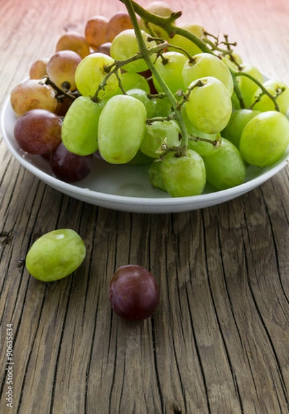 Fototapeta fresh raw grape on wooden table