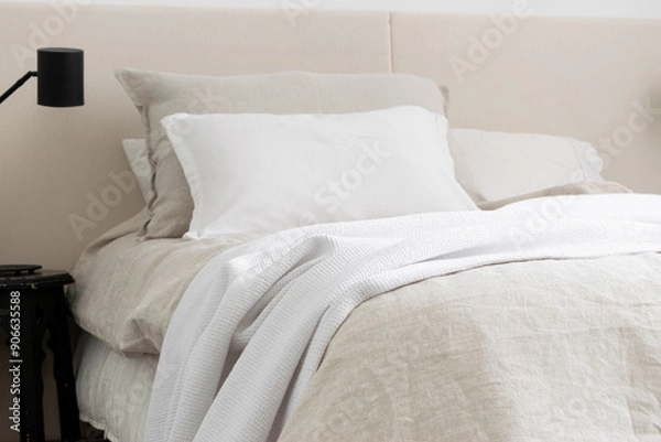Fototapeta Luxurious and Cozy Bed Linen and Covers for Elegant Bedroom Decor