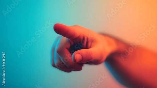 Fototapeta Pointing Finger: A hand pointing directly at the viewer with a gradient background.
